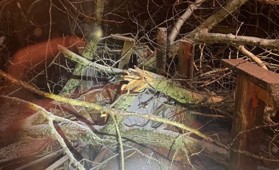 Storm debris on a floor deck damaging the house after a storm that happened at night in St. Louis.